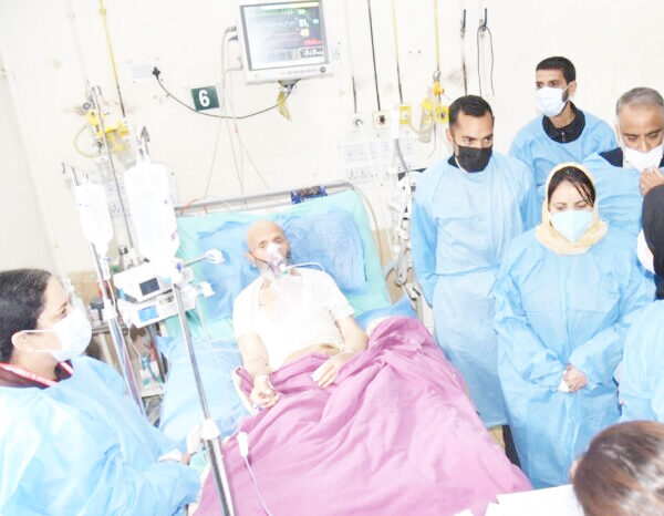 Health Minister visits ailing father of MP Er. Rashid at SMHS Hospital