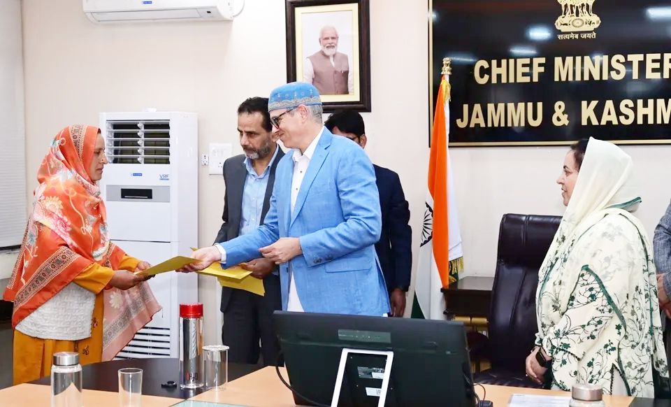 CM Omar Abdullah hands over regularisation orders to CPWs of School Education Department CM Omar Abdullah hands over regularisation orders to CPWs of School Education Department
