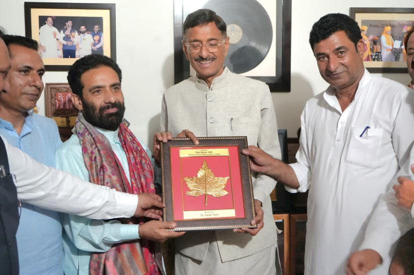 Union Minister Sanjay Seth felicitates eminent writer Dr Satish Vimal Union Minister Sanjay Seth felicitates eminent writer Dr Satish Vimal
