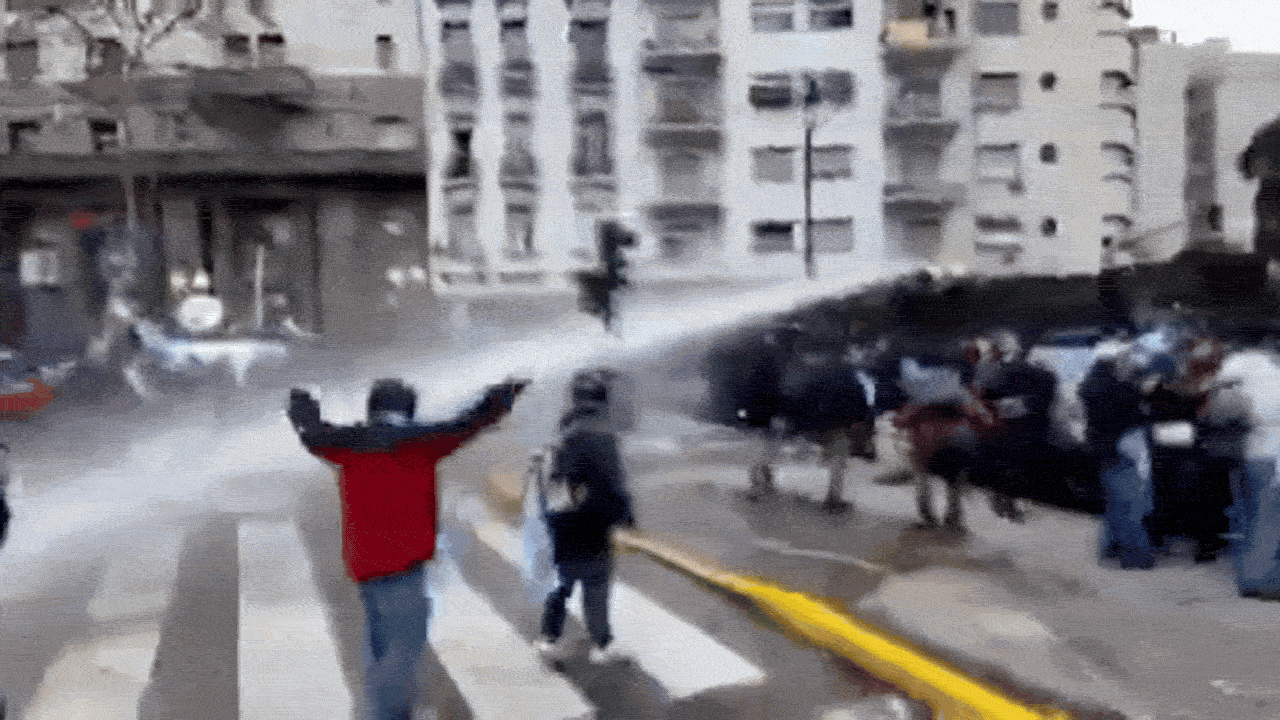 Argentina property bill protest: Police fire tear gas, water cannons at demonstrators — watch Argentina property bill protest: Police fire tear gas, water cannons at demonstrators — watch