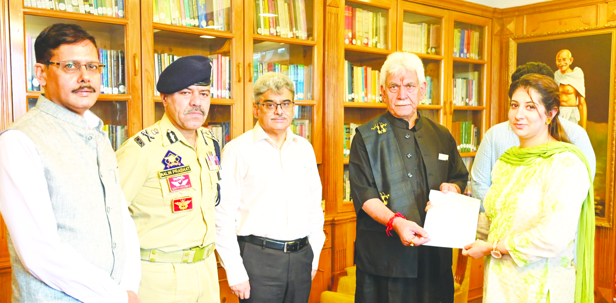 LG hands-over appointment letter to wife of Martyr J&K Police Inspector Masroor Ali Wani LG hands-over appointment letter to wife of Martyr J&K Police Inspector Masroor Ali Wani