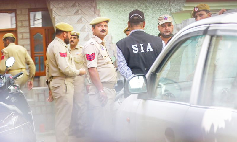 SIA Kashmir raids nine locations in 1990 double-murder case