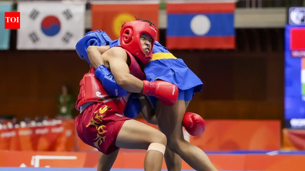 Roshibina Devi wins silver, falls short against China’s Zhang Xiaoyu in Asian Games final | Asian Games 2026 News Roshibina Devi wins silver, falls short against China’s Zhang Xiaoyu in Asian Games final | Asian Games 2026 News