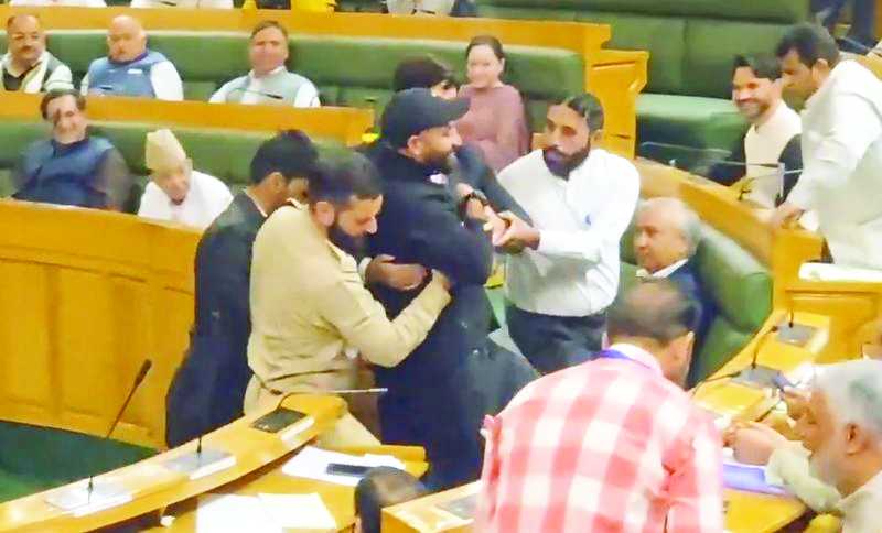 AAP MLA Mehraj Malik marshalled out of J&K Assembly AAP MLA Mehraj Malik marshalled out of J&K Assembly