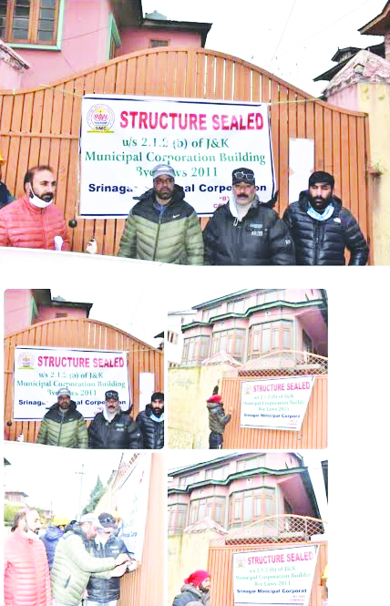 SMC seals five unauthorised structures across Srinagar SMC seals five unauthorised structures across Srinagar