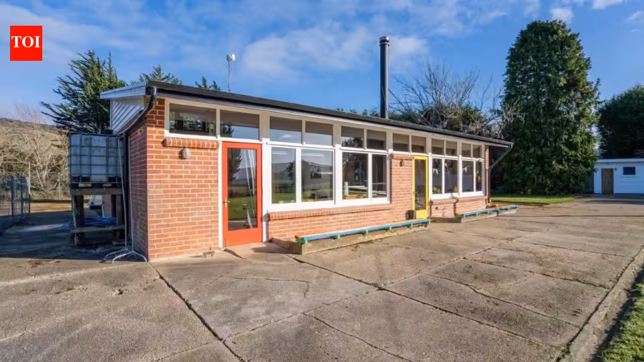 ​A New Zealand couple bought an abandoned school, then spent three years and about NZ0,000 turning the classroom into a home and chalet; the property is now listed for enquiries over NZ5,000