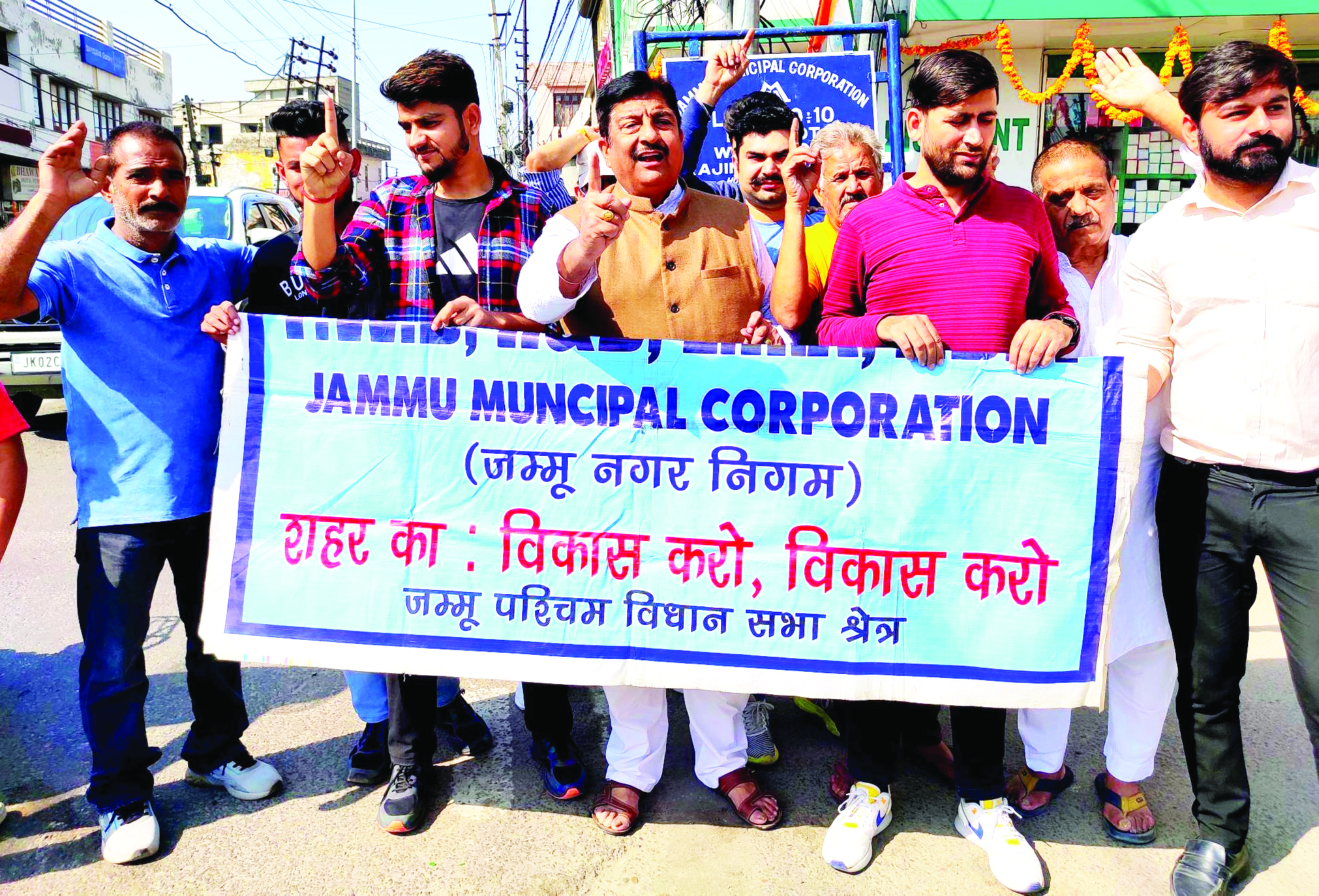 Dimple leads protest against JMC over action against traders, proposed flyover