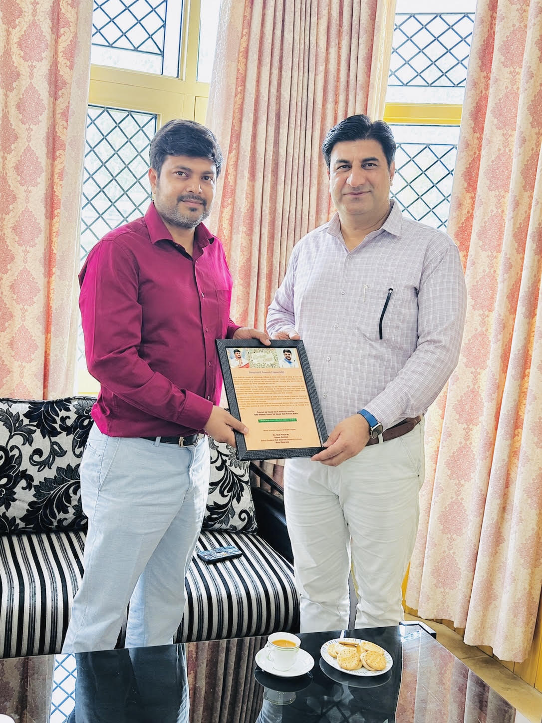 Dr. Nazir Hussain congratulates Dr. Devansh Yadav on his posting as DC Rajouri