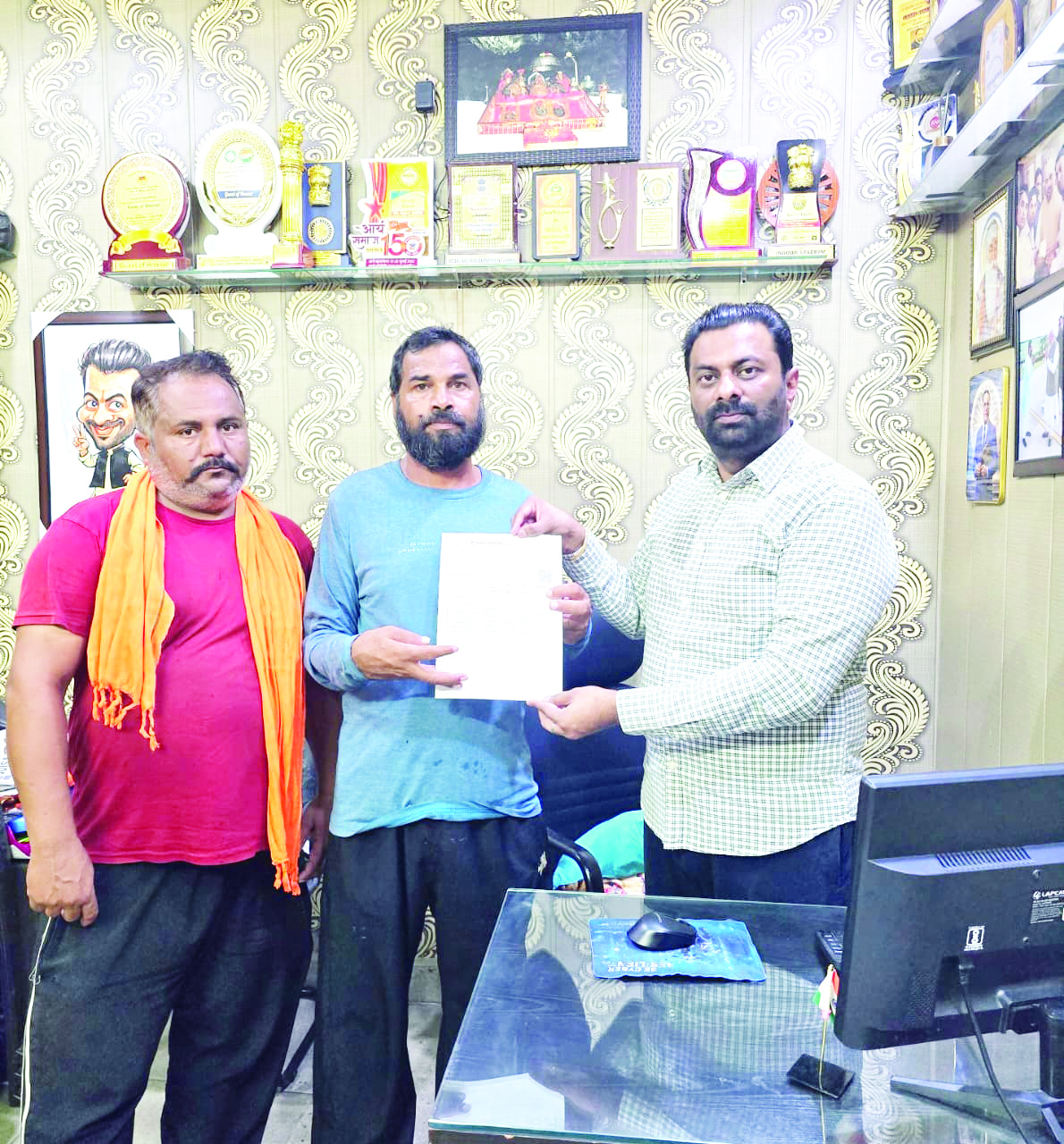 Keshav Chopra distributes Public Benefit Cards and Certificates